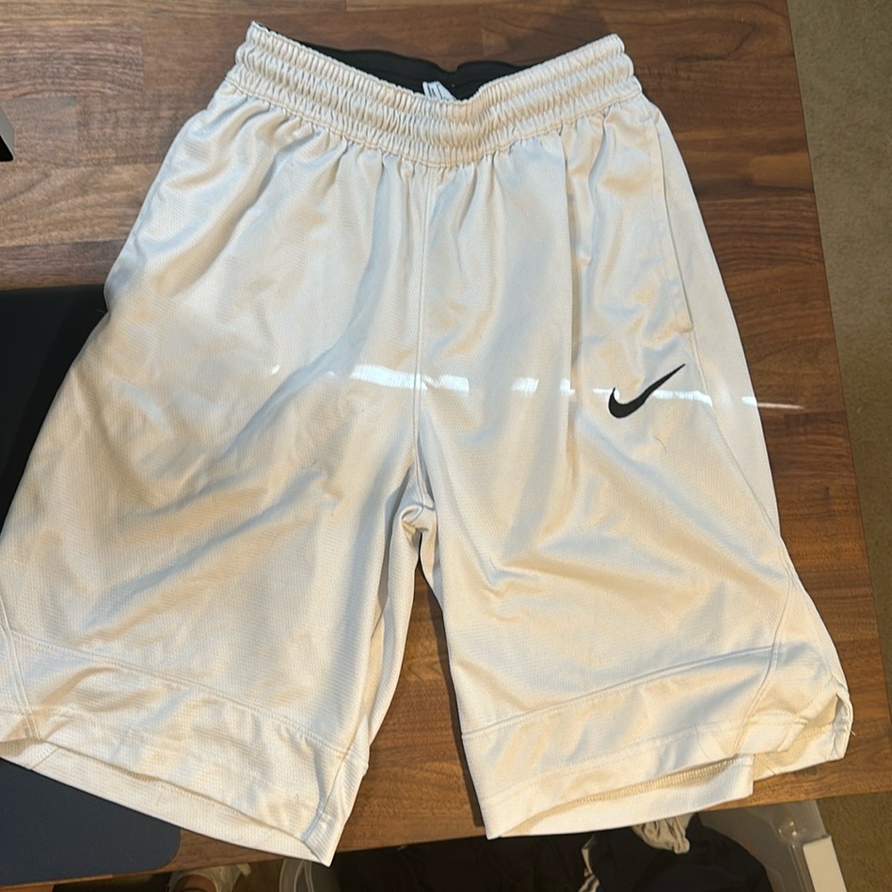 Nike driFIT white basketball shorts Men’s size small.